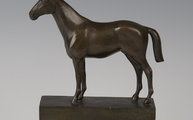 A late 20th century brown patinated cast bronze model of a horse standing four-square, bearing cast