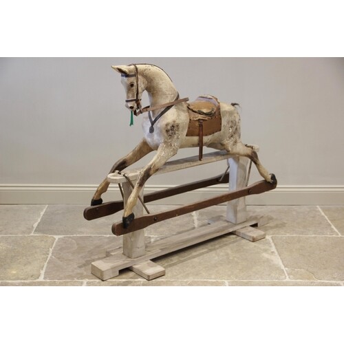 A late Victorian dapple grey rocking horse, bearing a thistl...