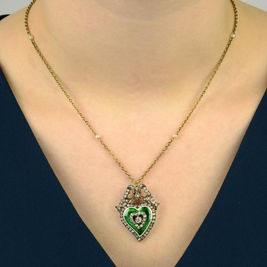 A late Victorian silver and gold, green enamel and