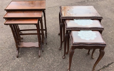 A mahogany nest of three rectangular tray-top tables, each with...