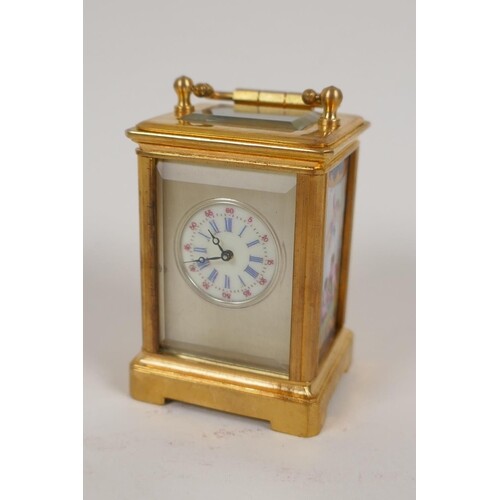 A miniature brass cased carriage clock with Sevres style por...
