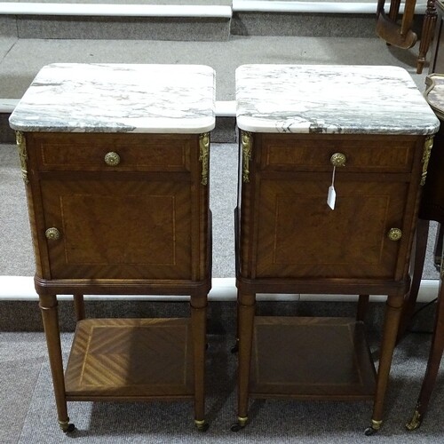 A pair of 19th/20th century French bedside cupboards, with m...