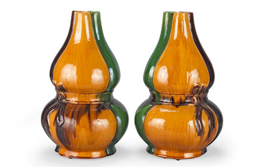A pair of Arts and Crafts pottery vases