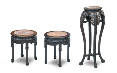 A pair of Chinese hardwood and rouge marble stands Late...