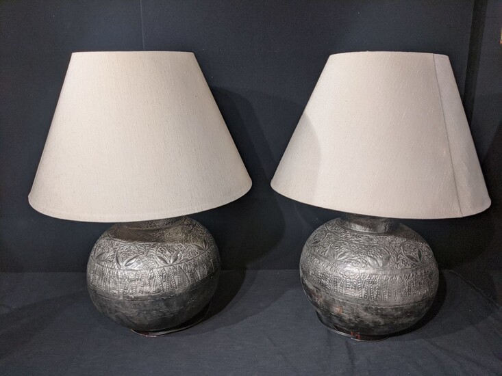 A pair of Eastern spherical silver colour table lamps,...