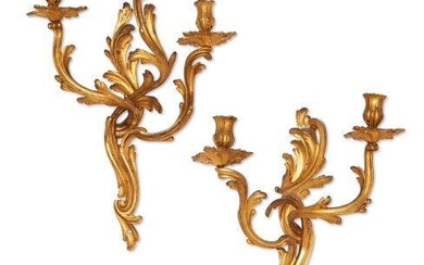 A pair of French three branch gilt...