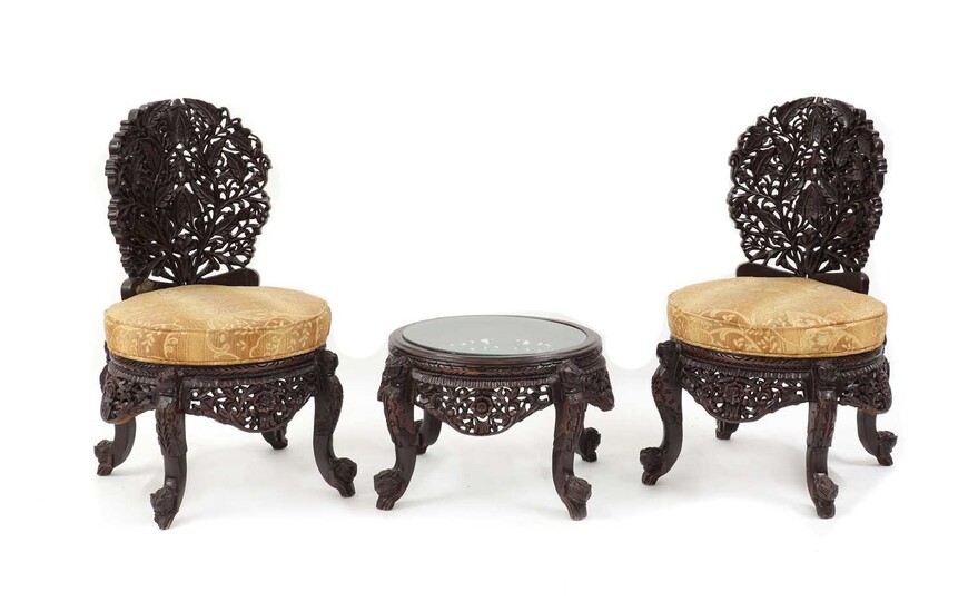 A pair of Indian style occasional chairs