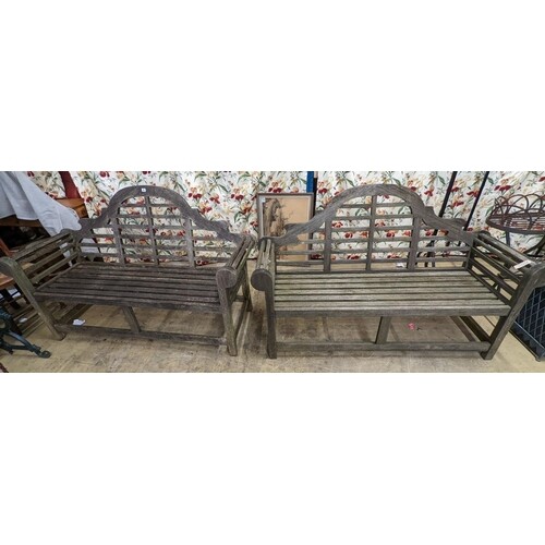 A pair of Lutyens style weathered teak garden benches, lengt...