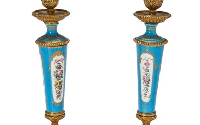 A pair of Sevres-style porcelain candlesticks