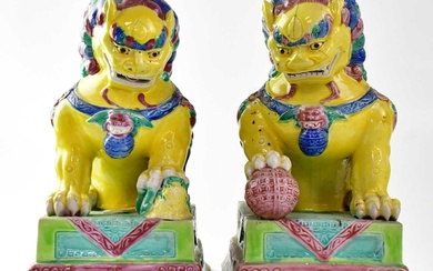 A pair of early 20th century European made Chinese guardian...