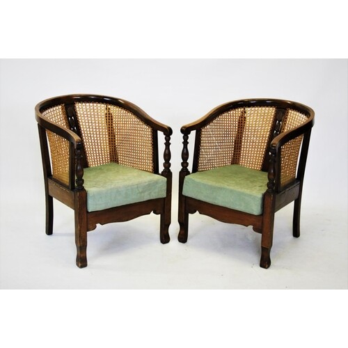 A pair of early 20th century stained beech wood rattan tub c...