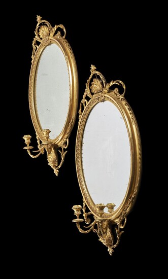 A pair of giltwood girandole wall mirrors