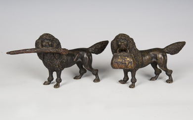 A pair of late 19th/early 20th century Austrian cast bronze models of poodles, one holding a handbag