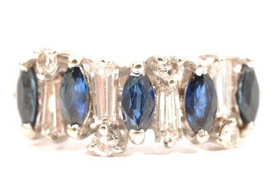 A sapphire and diamond half hoop ring.