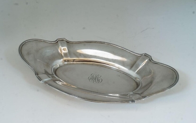 A silver dish, Birmingham, engraved Sterling A2785 Bigelow, Kennard & Co. to underside, with reeded and scalloped edge and having engraved initials to centre, 36.5cm wide, 19.5cm deep, weight approx. 13.8oz