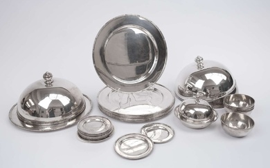A table collection of silver domes, plates, finger bowls and coasters