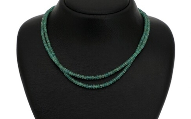 NOT SOLD. A two-strand emerald necklace set withn numerous faceted beads of emerald and a...