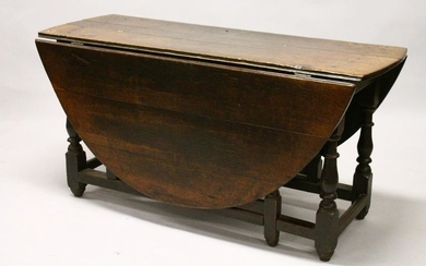 AN 18TH CENTURY OAK OVAL GATE-LEG DINING TABLE, with