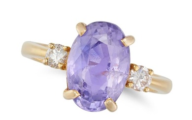 AN UNHEATED PURPLE SAPPHIRE AND DIAMOND THREE STONE RING set with an oval cut sapphire of