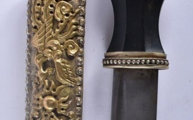AN UNUSUAL 18TH/19TH CENTURY CHINESE TIBETAN GILT REPOUSSE DAGGER decorated in relief with dragons a