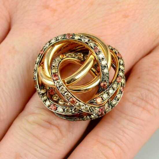 An 18ct gold 'coloured' diamond and orange sapphire