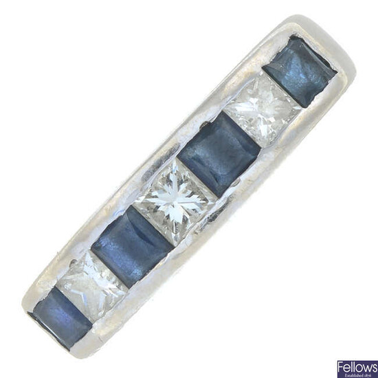 An 18ct gold square-shape diamond and sapphire seven-stone ring.