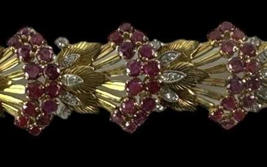 An 18ct yellow gold Art Deco style ruby and diamond...