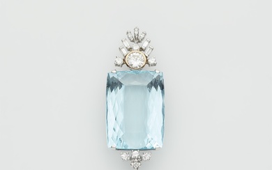 An 18k bicolour gold, diamond and large aquamarine pendant.