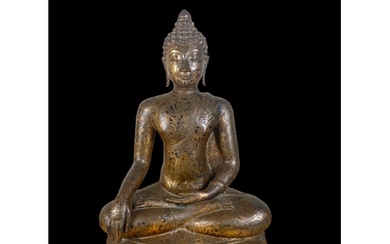 An 18th century Thai gilt bronze seated figure of Buddha Sha...