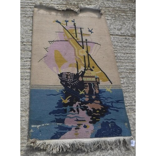 An Art Deco Chinese rug with ship design in yellow and blue ...