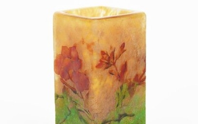 An Art Nouveau Daum Nancy enamelled glass vase, square section mottled yellow glass body enamelled in red and green with wallflowers, acid etched Daum Nancy mark, 12cm. high