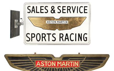 An 'Aston Martin - Sales & Service Sports Racing' illuminating display sign
