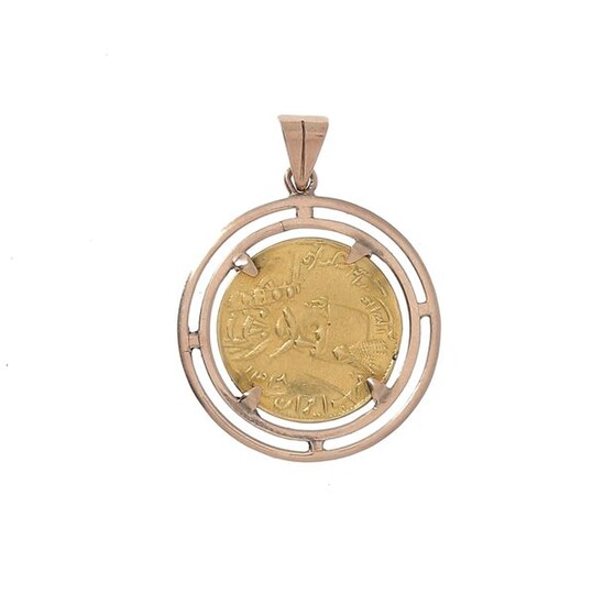 An Iranian gold coin mounted as a pendant on 14 K yellow gold (585 °/°°).