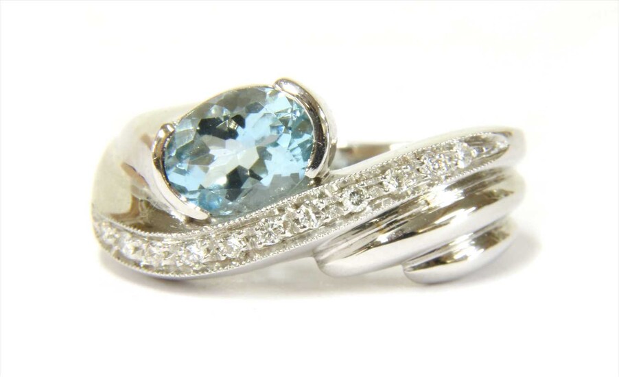 An Italian white gold aquamarine and diamond ring