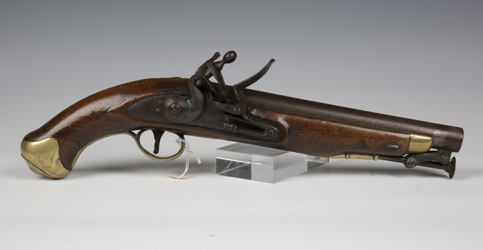 An early 19th century flintlock pistol by Woolley, Sargant & Fairfax, barrel length 22.5cm, with