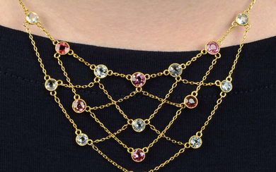 An early 20th century 18ct gold pink tourmaline and aquamarine lattice necklace.