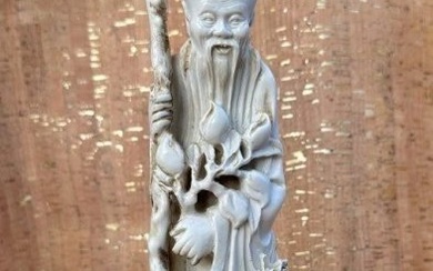 Antique Chinese Carved bone Figurine of Shoulau