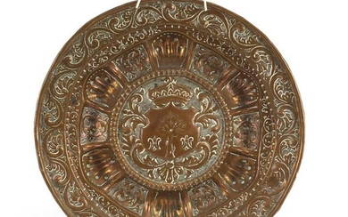 Antique copper plate embossed with a heraldic crest