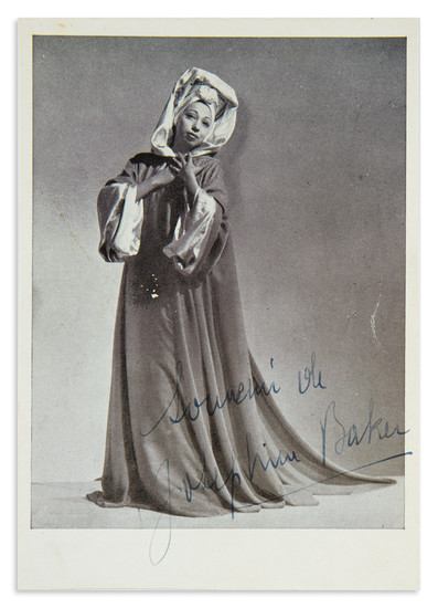 BAKER, JOSEPHINE. Photograph Signed and Inscribed, "Souvenir de / Josephine Baker," full-length portrait...