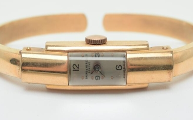 Baume and Mercier bracelet cuff watch, 18k gold band