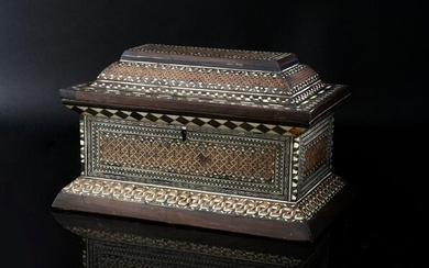 Box in bone, ebony, lead and horn veneer inlaid with certosina and decorated with Greek friezes, chevrons and stars.
