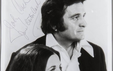 Cash, Johnny (1932-2003) and June Carter Cash (1929-2003) Signed Photograph. Black-and-white 8 x 10 in. portrait of the two musicians i