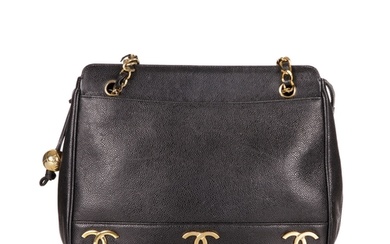 Chanel, a vintage caviar leather handbag, crafted from black...