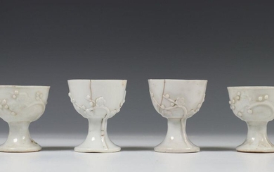 China, two pairs of blanc-de-Chine cups, ca.1800, modeled...