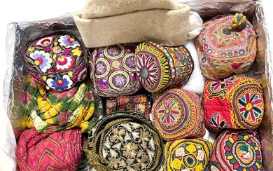 Collection of embroidered hats and hoods, Gujurat, Afghanistan, and Pakistan