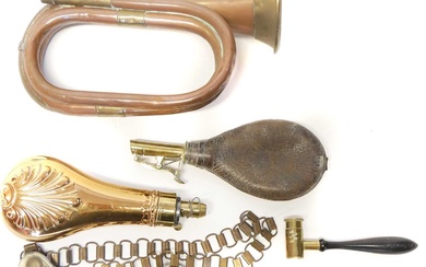 Collection of items, to include a Royal Artillery bugle, one...