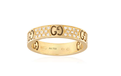 Description A GOLD AND DIAMOND RING BY GUCCI, the...