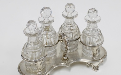 Early 19th century silver four bottle cruet stand, Rebecca E...