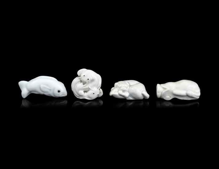 Four Japanese White Glazed Porcelain Animal-Form Netsuke