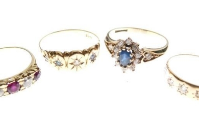 Four assorted rings comprising 18ct gold and three stone...